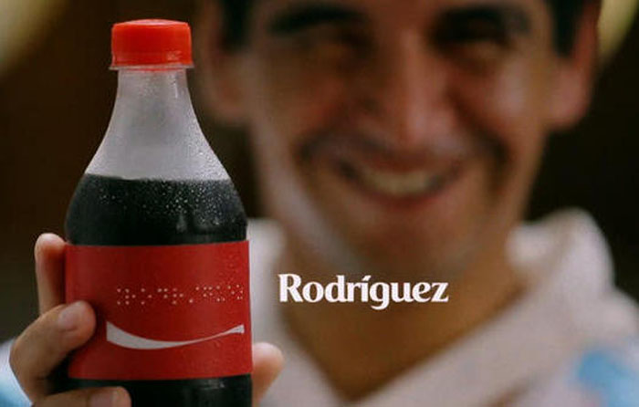 可口可乐用盲文分享幸福(中国包装设计网-包联天下，包装方案解决平台新装上市，新包装上市等相关图片)