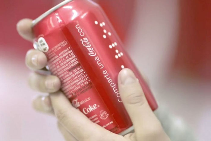 可口可乐用盲文分享幸福(中国包装设计网-包联天下，包装方案解决平台新装上市，新包装上市等相关图片)